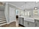 Transitional kitchen featuring stainless steel appliances and dark hardwood floors at 2333 Town Woods Rd, Charleston, SC 29414