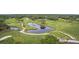 Aerial view of the golf course showing ponds and lush green landscaping at 2774 Hidden Oak Dr, Seabrook Island, SC 29455