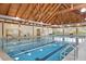 Indoor pool with swimming lanes and natural lighting at 2774 Hidden Oak Dr, Seabrook Island, SC 29455