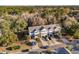 Aerial view of the townhome community surrounded by mature trees and lush greenery at 2886 Woodland Park Dr, Mount Pleasant, SC 29466