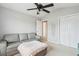 Cozy bedroom with a sofa and a ceiling fan at 2886 Woodland Park Dr, Mount Pleasant, SC 29466