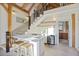 The modern kitchen features a breakfast bar, floating shelves, and beverage cooler, perfect for entertaining guests at 34 Percy St, Charleston, SC 29403