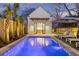 Backyard pool with outdoor seating and lush landscaping at 34 Percy St, Charleston, SC 29403
