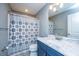 Bathroom featuring a vanity with granite countertop and a shower with a patterned curtain at 3405 Painswick Rd, Johns Island, SC 29455