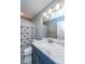Bathroom featuring a vanity with granite countertop, great lighting, and a patterned shower curtain at 3405 Painswick Rd, Johns Island, SC 29455