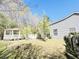 A large backyard with a gazebo and a deck surrounding the house at 344 Eagle Ridge Rd, Summerville, SC 29485