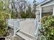 Backyard deck with a white railing and steps at 344 Eagle Ridge Rd, Summerville, SC 29485