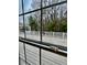 Backyard deck view through a window at 344 Eagle Ridge Rd, Summerville, SC 29485