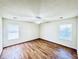 Spacious bedroom features hardwood floors, ceiling fan, and bright, window-filled natural light at 344 Eagle Ridge Rd, Summerville, SC 29485