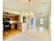 Open concept living area that flows into the kitchen with a breakfast bar, creating an inclusive atmosphere at 344 Eagle Ridge Rd, Summerville, SC 29485