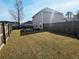 Backyard with a large grass lawn, a fenced perimeter, and a view of the house at 3614 Haymont Ln, Ladson, SC 29456