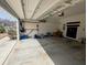 An attached garage with plenty of room for parking, storage shelves and peg boards at 3614 Haymont Ln, Ladson, SC 29456