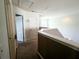 View of the upstairs hallway with neutral colors and carpet; doors leading to bedrooms and bath at 3614 Haymont Ln, Ladson, SC 29456