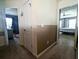 View of the upper hallway with doors leading to bedrooms; neutral colored walls and carpet at 3614 Haymont Ln, Ladson, SC 29456