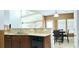 Updated kitchen features stone countertops, undermount sink, and convenient access to dining at 3614 Haymont Ln, Ladson, SC 29456