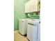Functional laundry room with overhead cabinets for ample storage space at 3614 Haymont Ln, Ladson, SC 29456