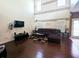 Spacious living room featuring high ceilings, hardwood floors, and a comfortable seating arrangement at 3614 Haymont Ln, Ladson, SC 29456