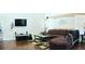 Spacious living room featuring high ceilings, hardwood floors, and a comfortable seating arrangement at 3614 Haymont Ln, Ladson, SC 29456
