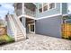 Outdoor patio with stylish pavers and stairs leading to a screened porch at 3726 Apiary Ln, Johns Island, SC 29455