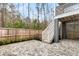 Fenced backyard featuring a paver patio and lush landscaping for outdoor enjoyment at 3726 Apiary Ln, Johns Island, SC 29455