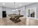 Basement game room with a pool table, wet bar, and access to the patio at 3726 Apiary Ln, Johns Island, SC 29455