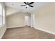 Well-lit bedroom offers luxury vinyl plank flooring, ceiling fan, and neutral paint at 3726 Apiary Ln, Johns Island, SC 29455