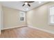 This bedroom has luxury vinyl plank flooring, neutral paint, and a ceiling fan at 3726 Apiary Ln, Johns Island, SC 29455