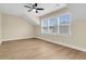 Bright bedroom with large windows, ceiling fan, and luxury vinyl plank flooring at 3726 Apiary Ln, Johns Island, SC 29455