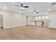 Large bonus room features recessed lighting, ceiling fans, and luxury vinyl plank flooring at 3726 Apiary Ln, Johns Island, SC 29455