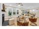Inviting living room with fireplace, large windows, comfortable seating, and stylish decor at 3726 Apiary Ln, Johns Island, SC 29455