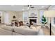 Inviting living room with a fireplace, comfortable seating, and a neutral color palette at 3726 Apiary Ln, Johns Island, SC 29455