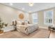 Serene main bedroom with neutral tones, hardwood floors, and ample natural light at 3726 Apiary Ln, Johns Island, SC 29455