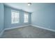 This bedroom features two windows for ample natural light at 414 Hamlet Cir, Goose Creek, SC 29445