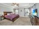 This main bedroom has a tray ceiling and large windows for natural light at 414 Hamlet Cir, Goose Creek, SC 29445