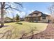 Expansive backyard featuring lush green lawn, mature trees and established perimeter landscaping for privacy at 4162 Club Course Dr, North Charleston, SC 29420