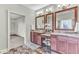 Spacious Primary bathroom with and granite vanities, decorative mirrors, and plenty of counter space at 4162 Club Course Dr, North Charleston, SC 29420