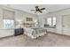 Cozy bedroom features a large bed, bedside tables, and a window seat, offering a relaxing retreat at 4162 Club Course Dr, North Charleston, SC 29420