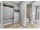 View from bedroom shows closet and en-suite bathroom with shower and tub at 4162 Club Course Dr, North Charleston, SC 29420