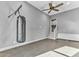 Versatile bonus room with high ceilings, a ceiling fan, and a punching bag setup, perfect for a gym at 4162 Club Course Dr, North Charleston, SC 29420