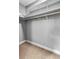 A basic storage closet with carpeted floors, white shelving, and neutral grey paint at 4162 Club Course Dr, North Charleston, SC 29420