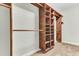 Spacious walk-in closet with built-in shelving and hanging rods for optimal organization at 4162 Club Course Dr, North Charleston, SC 29420