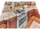 Modern kitchen featuring granite counters, stainless steel appliances, and updated cabinets at 4162 Club Course Dr, North Charleston, SC 29420