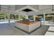 Outdoor grilling area with a built-in grill, countertop, and covered seating, great for entertaining at 4162 Club Course Dr, North Charleston, SC 29420