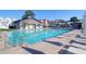 Pool area with lounge chairs and tables at 4416 Louisa Ln, North Charleston, SC 29405