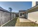 Private backyard featuring a fenced yard, patio, and lush greenery, perfect for outdoor entertaining and relaxation at 501 Hedge Way, Summerville, SC 29486