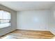 Bright and airy bedroom with wood floors, a window for natural light, and ample space for furniture arrangement at 501 Hedge Way, Summerville, SC 29486
