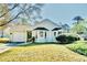Charming single-story home featuring a well-maintained front yard and an attached garage, creating a welcoming curb appeal at 501 Hedge Way, Summerville, SC 29486