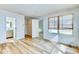 Inviting main bedroom with wood floors, natural light, closet, and an ensuite bathroom for added privacy at 501 Hedge Way, Summerville, SC 29486