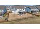 Aerial view of a lovely fenced backyard with a cozy outdoor seating area at 624 Sienna Way, Summerville, SC 29486