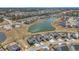 Wide shot of the community featuring a central lake and well-spaced homes at 624 Sienna Way, Summerville, SC 29486